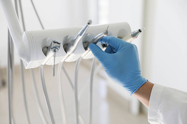 Professional Emergency Dentist technician working in Muscle Shoals, AL
